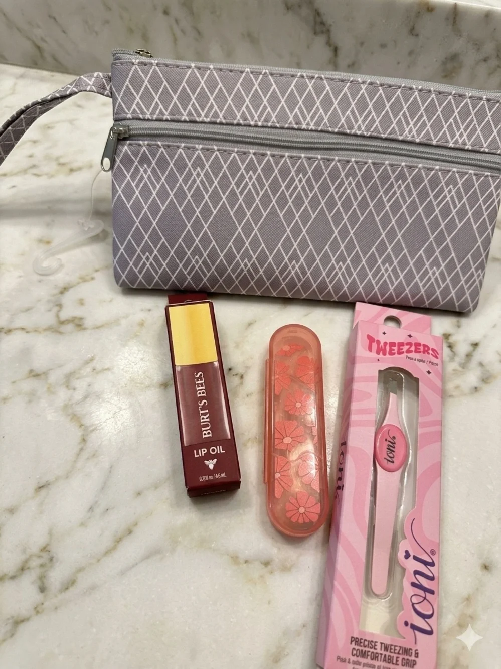 Burt's Bees Lip Oil, Pink Tweezers & Gray Patterned Cosmetic Pouch